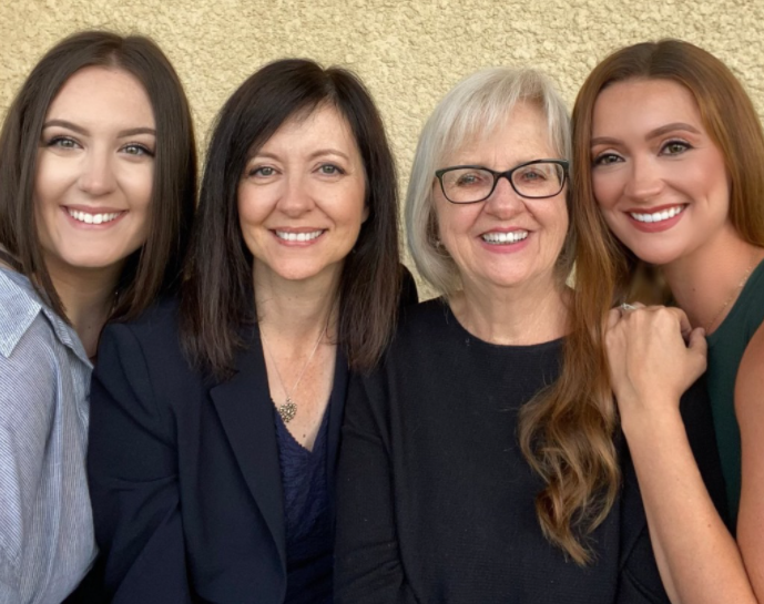 Joy Smith with her daughters, including CEO and President of the Joy Smith Foundation, Janet Campbell, to her left. 