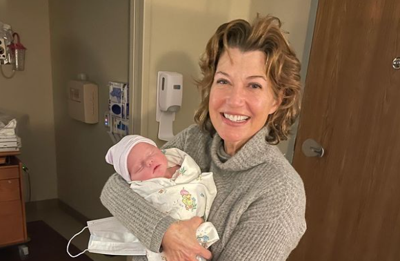 Amy Grant with her new granddaughter