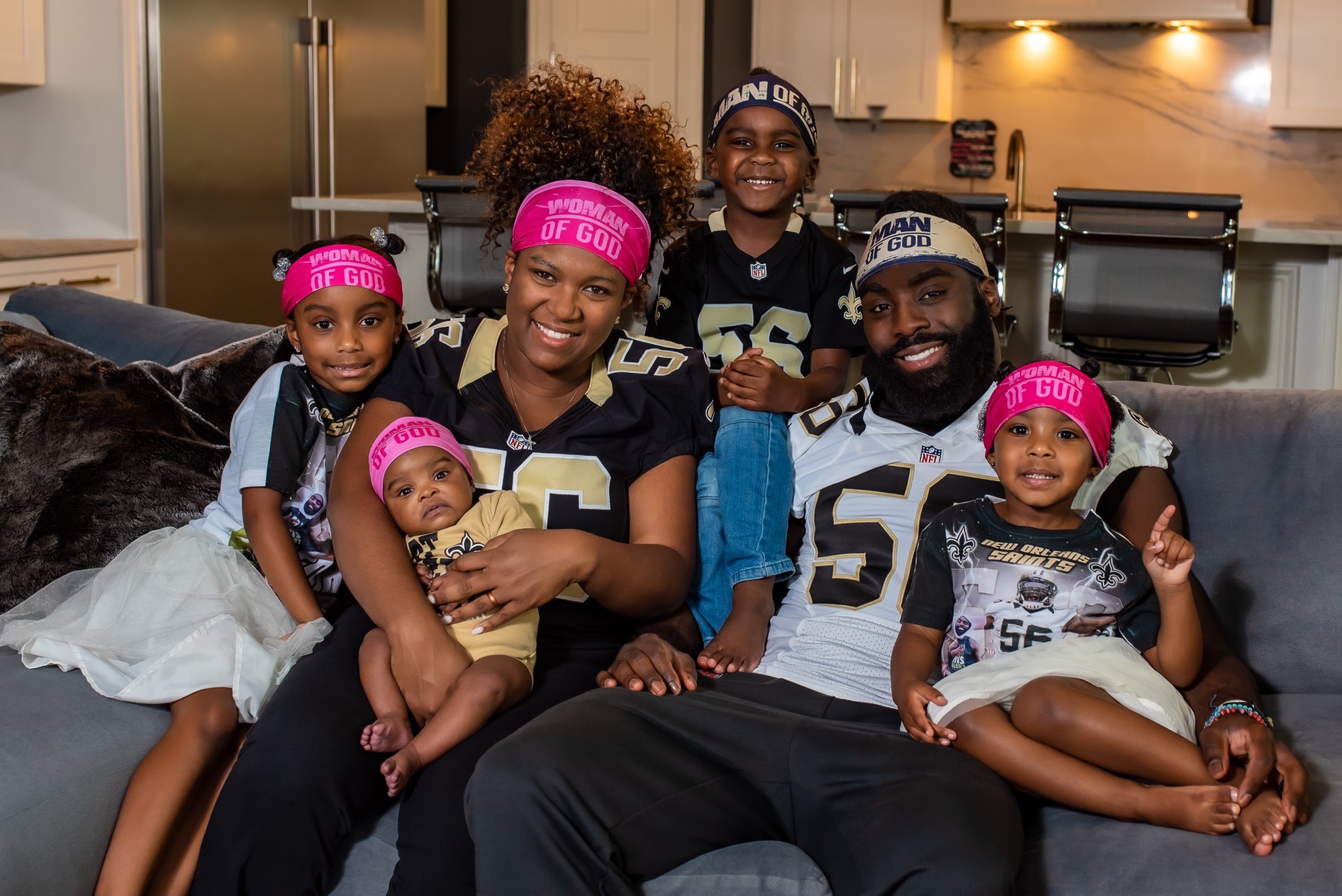 Demario A Davis and his wife and children. 