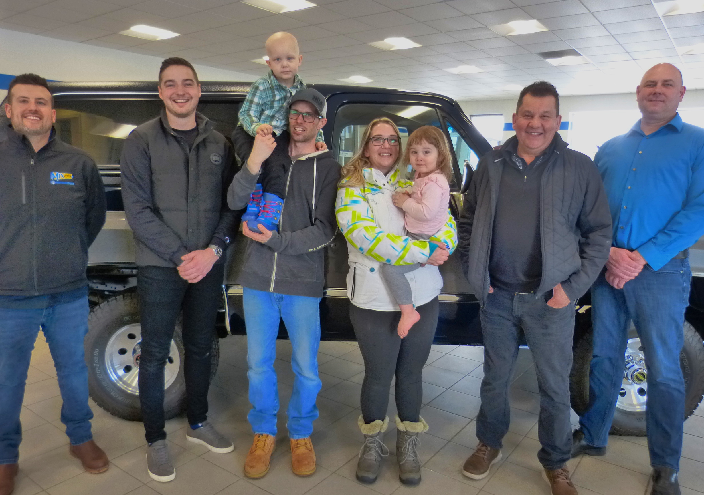 A group photo with Lucas Pierce and his family at South Fort Chevrolet.