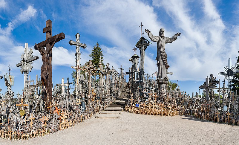 lots of crosses of different sizes and materials on a higll