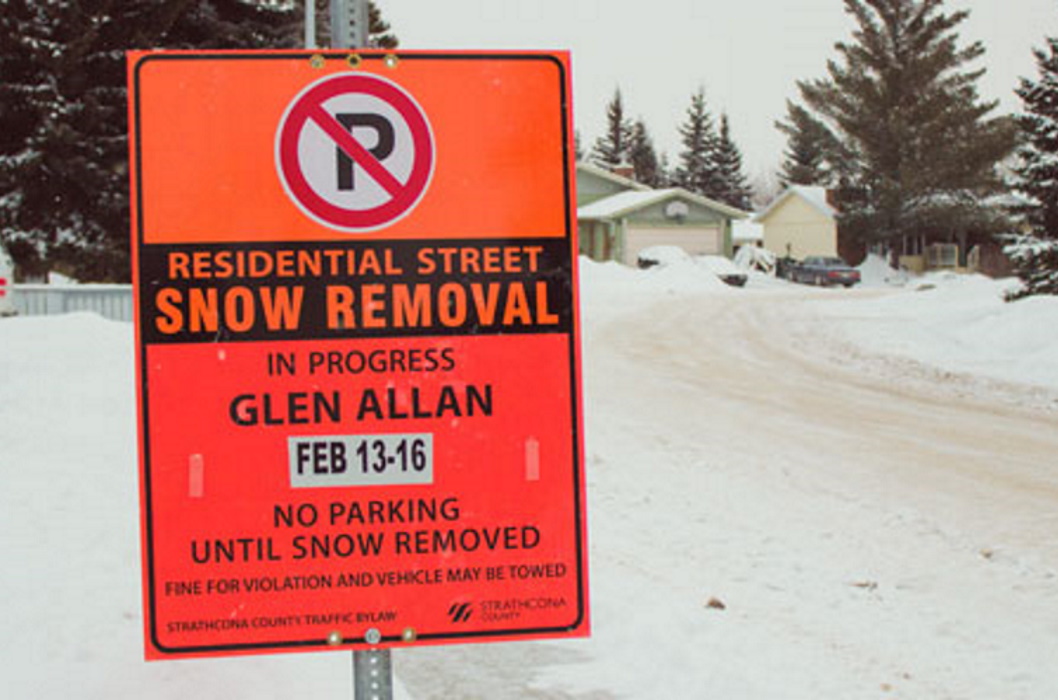 A snow removal sign.