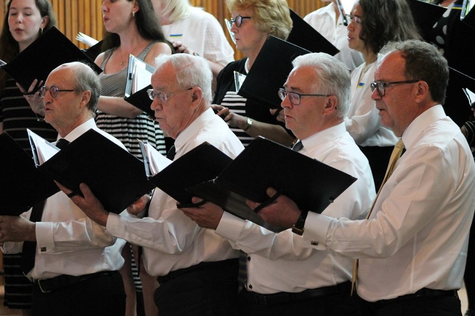 Choir members singing