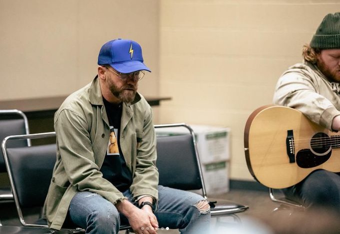 TobyMac does church backstage on tour with his crew.