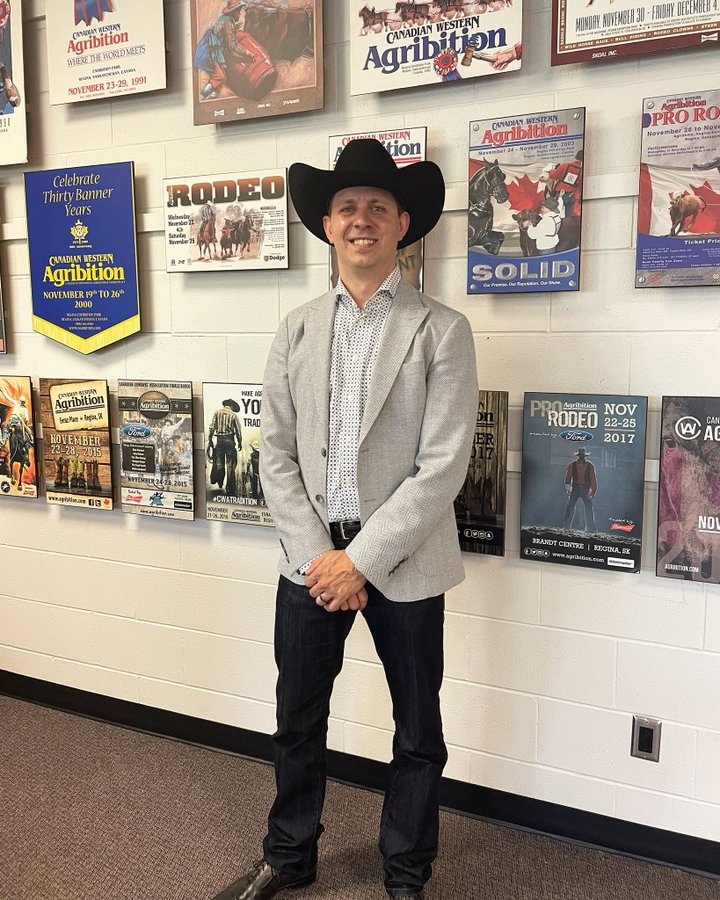 Photo of Shaun Kindopp in western attire including cowboy hat and boots 
