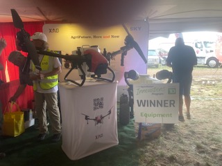 Drone pilot talking about using a double propped drone to spray crops