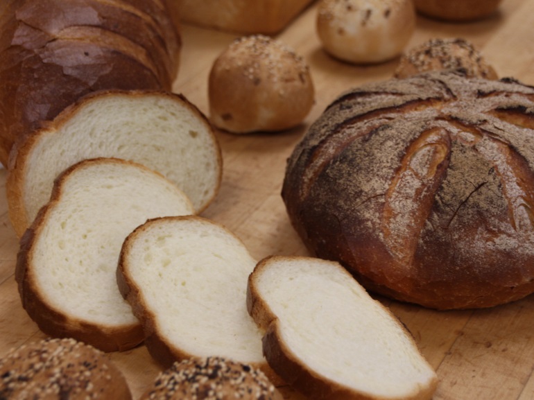 freshly baked bread sitting on the cupboard