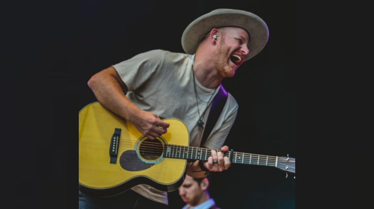 Jordan St. Cyr during a concert with his guitar. 