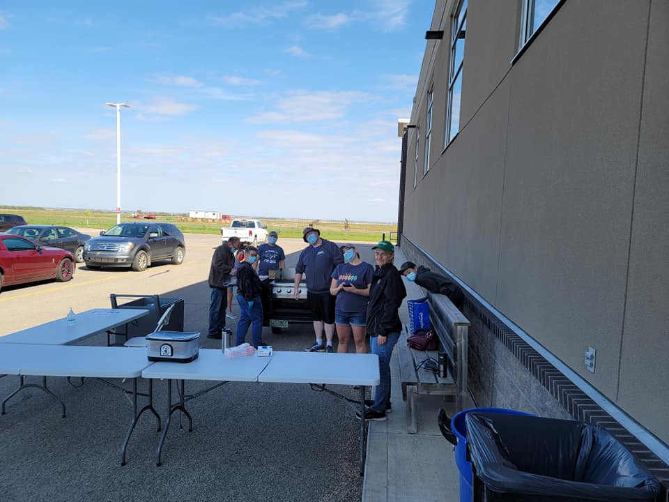 a group of people at a bbq