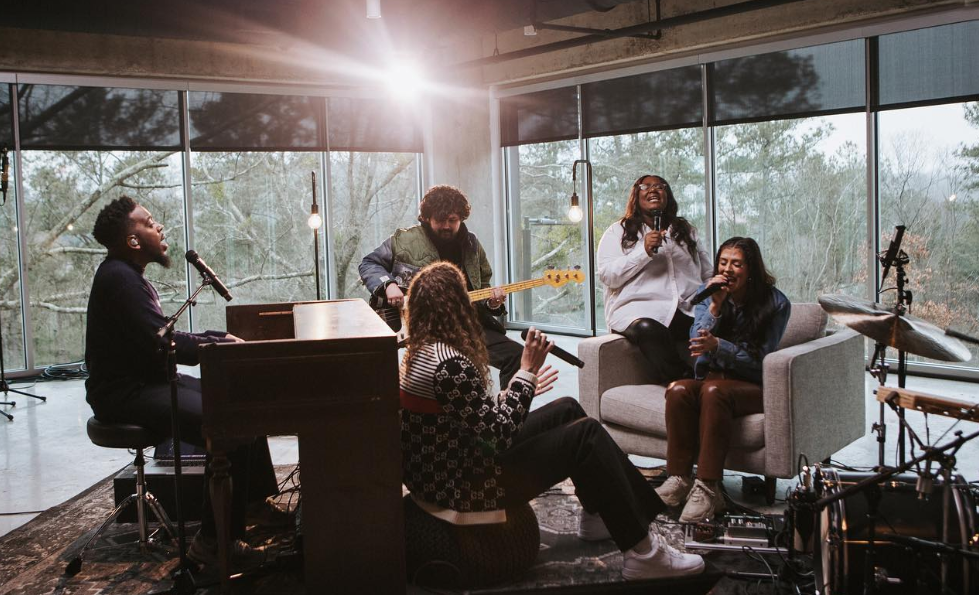 Maverick City Music in a home writing songs. 