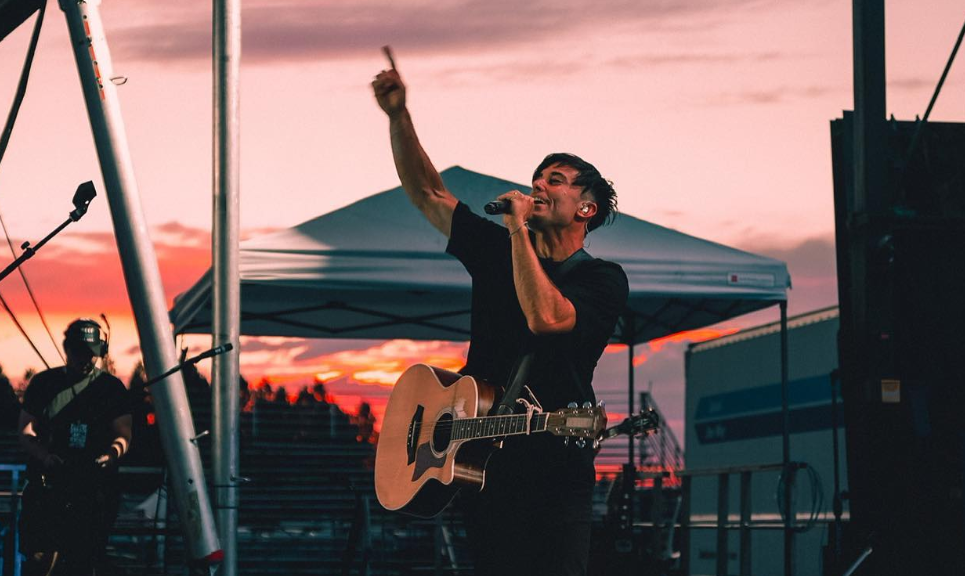 Phil Wickham performing on stage. 