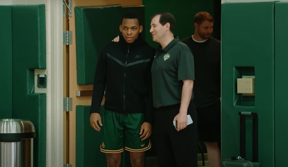 Baylor University basketball coach Scott Drew talking to one of his players. 