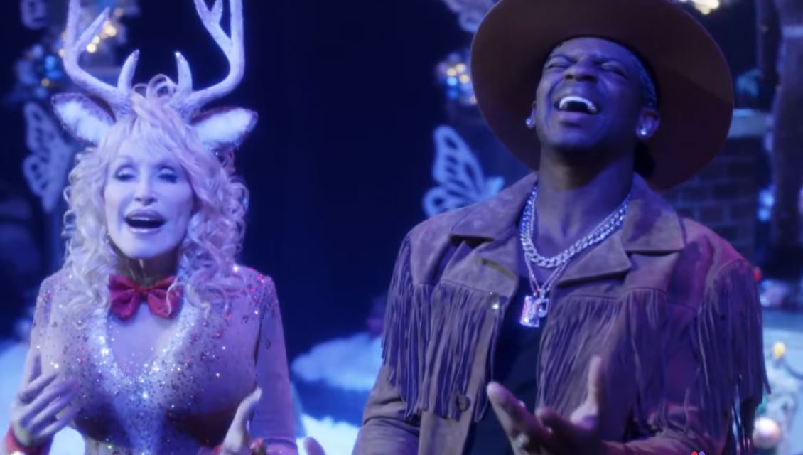 Dolly Parton and Jimmy Allen on Parton's Christmas special. 
