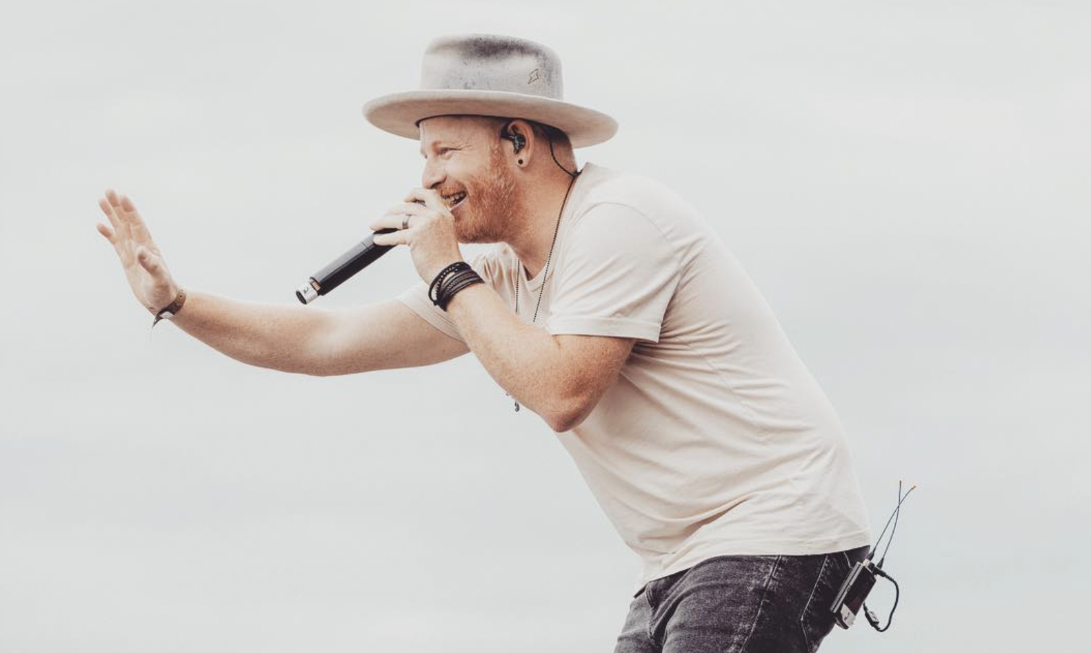 Jordan St. Cyr while singing on stage