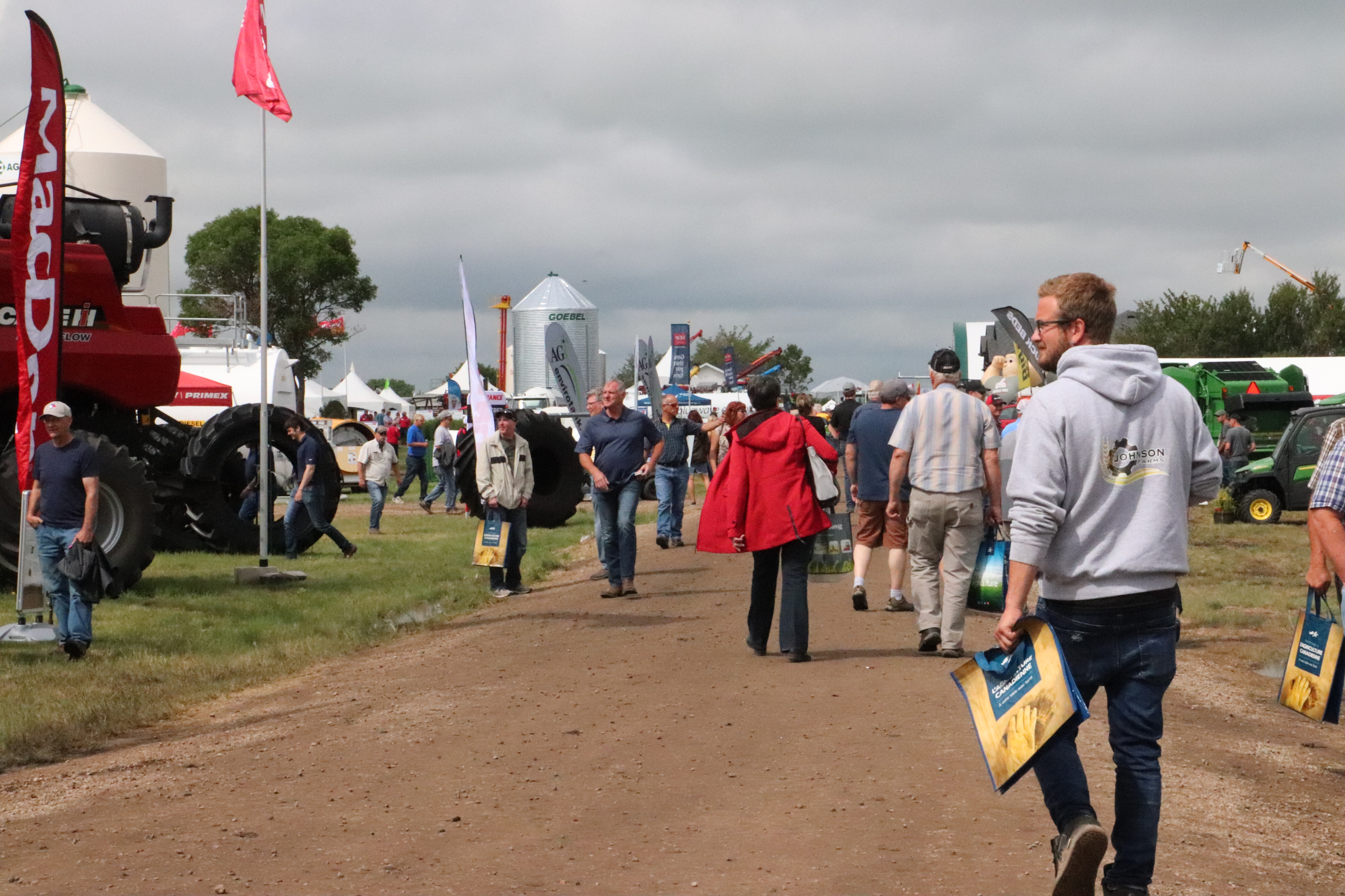 visitors checking out the outdoor exhibitors at  Ag in Motion