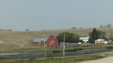 farm yard with a red barn