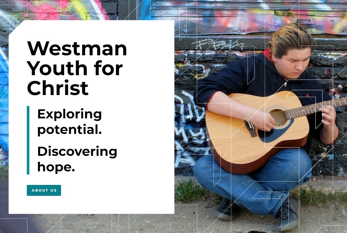 a young man playing the guitar