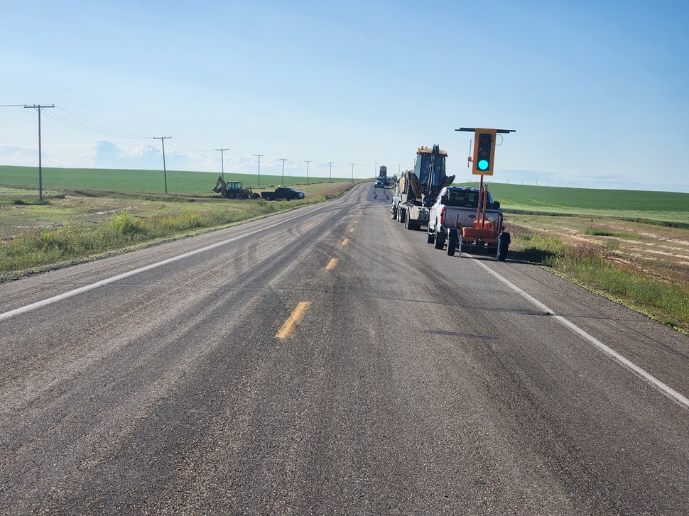 A patch project just outside of Cabri that required a traffic light to direct traffic while reduced to a single lane. (photo by Hayden Michaels)