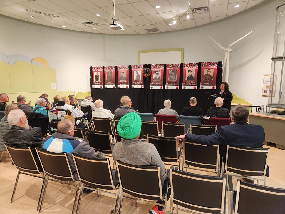 A crowd sits and listens to the shared stories of the veteran's being unveiled. (photos by Hayden Michaels)