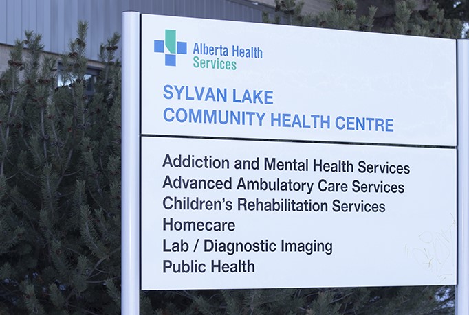 Sylvan Lake Advanced Ambulatory Care Service sign. 