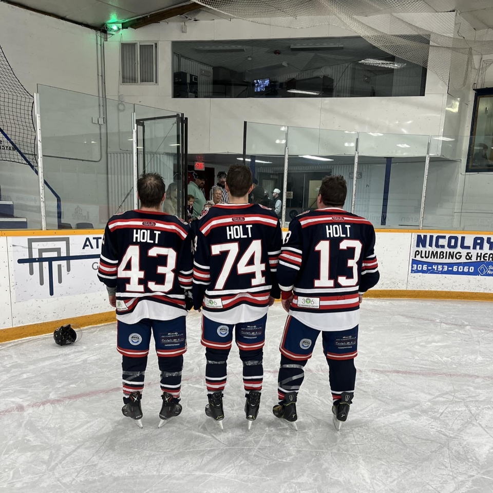 Todd Holt with his sons - Carlyle Cougars 121324 - credit Todd Holt
