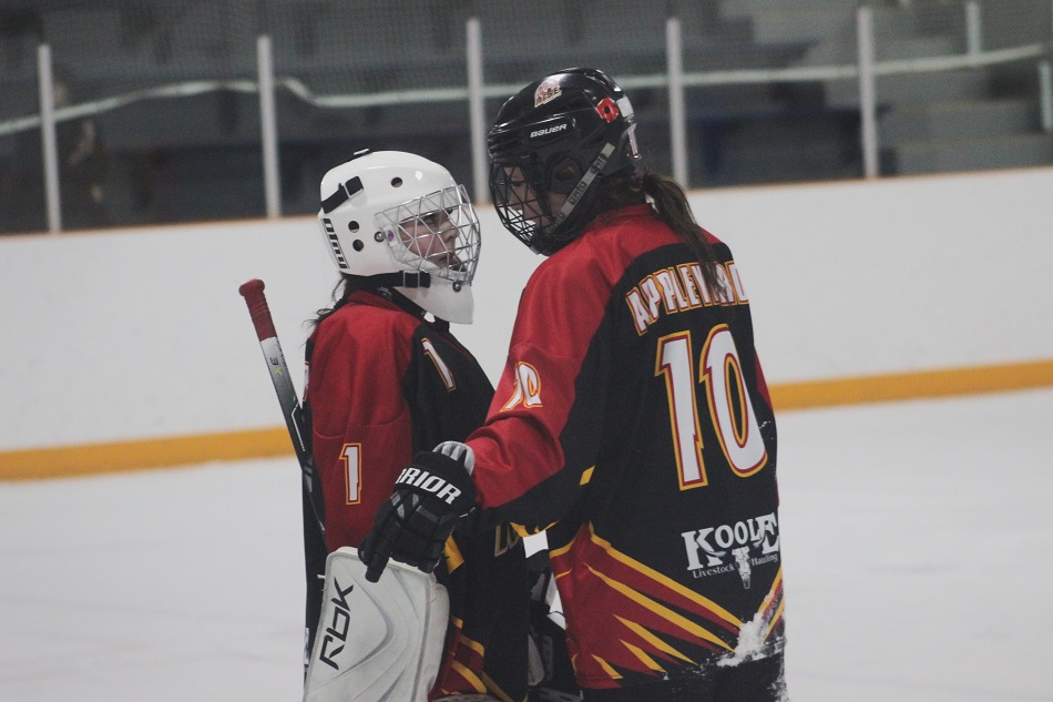 Two Strathmore players during the Laurie Morton Rupp Memorial Tournament.