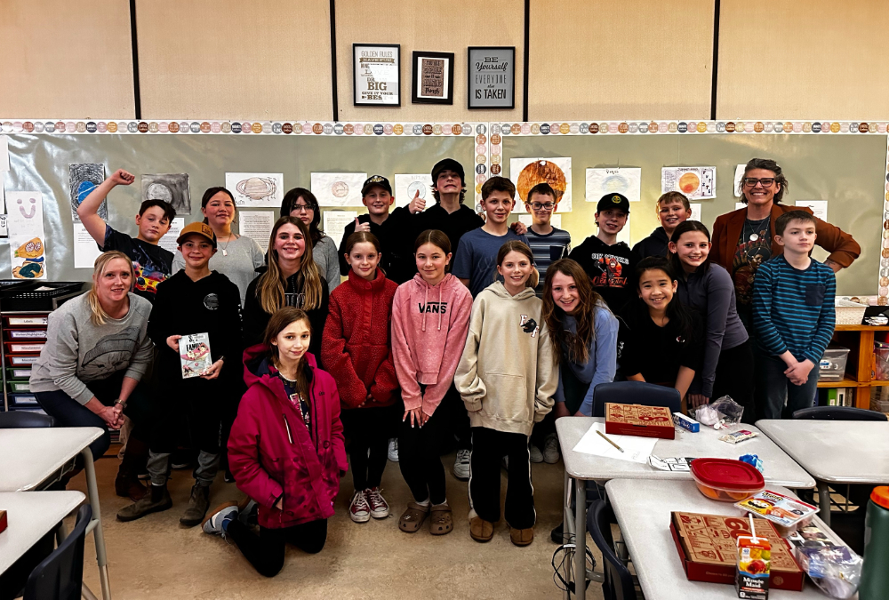 The Eagle's morning host Joelle Reimer with the kids from Ms. Karran's grade 6 class.