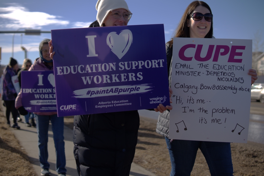 CUPE Local 5040 members picketing near the Foothills Composite High School on February 24, 2025. OkotoksOnline/Harrison O'Nyons