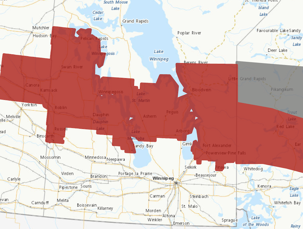 a map shows central manitoba highlighted in red