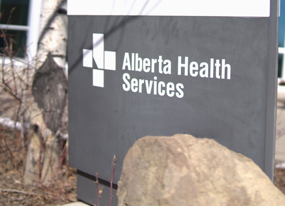 An Alberta Health Services sign in Okotoks.