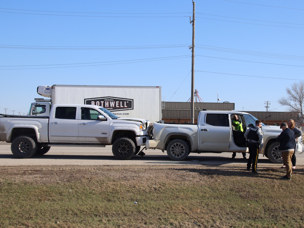 a pickup crashed into the back of another pickup