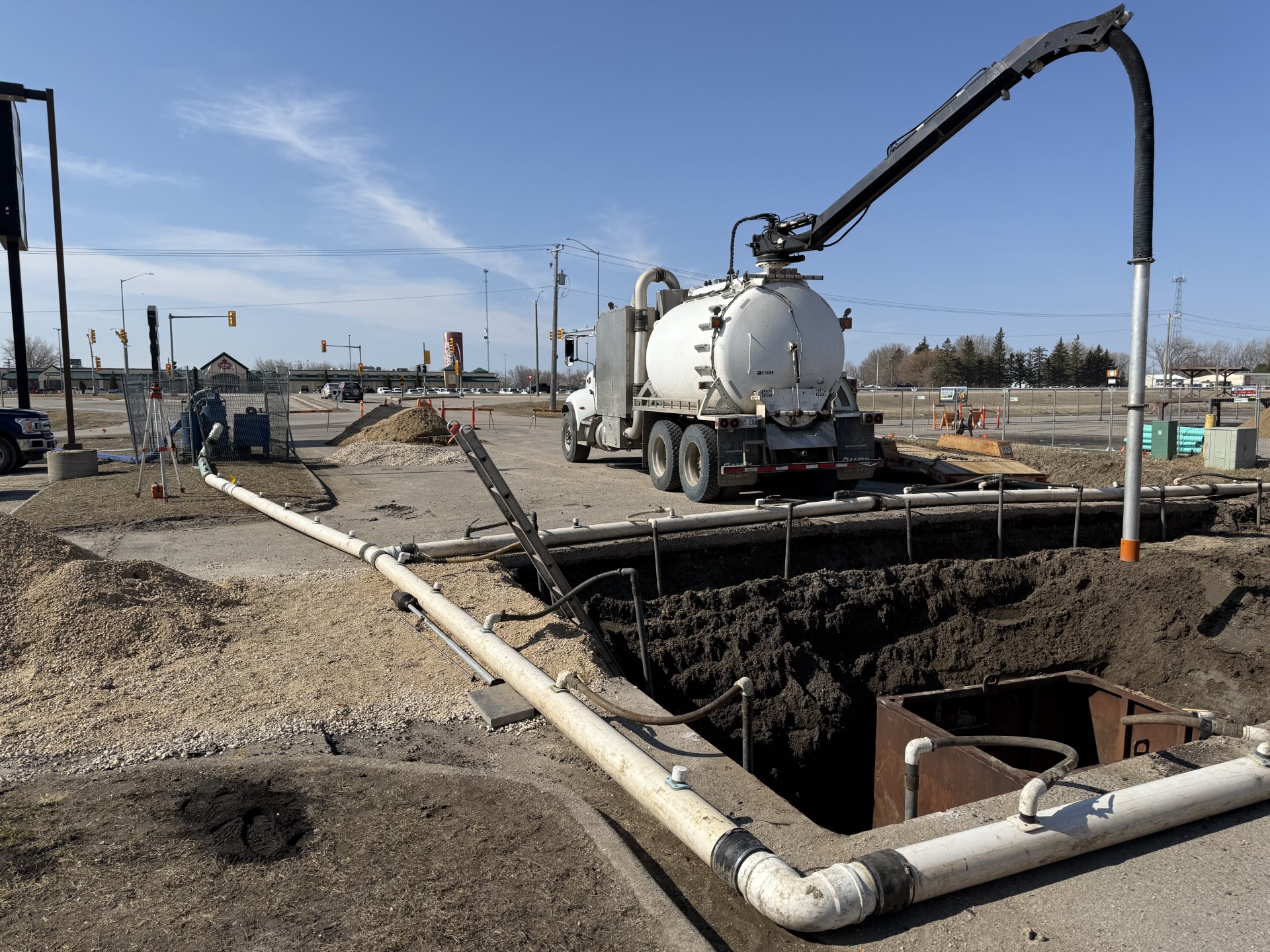 Construction on 24th Street NW in Portage la Prairie, working on sewer and water