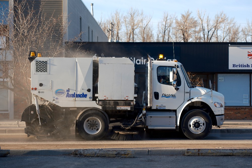 Street sweeping truck in Okotoks.