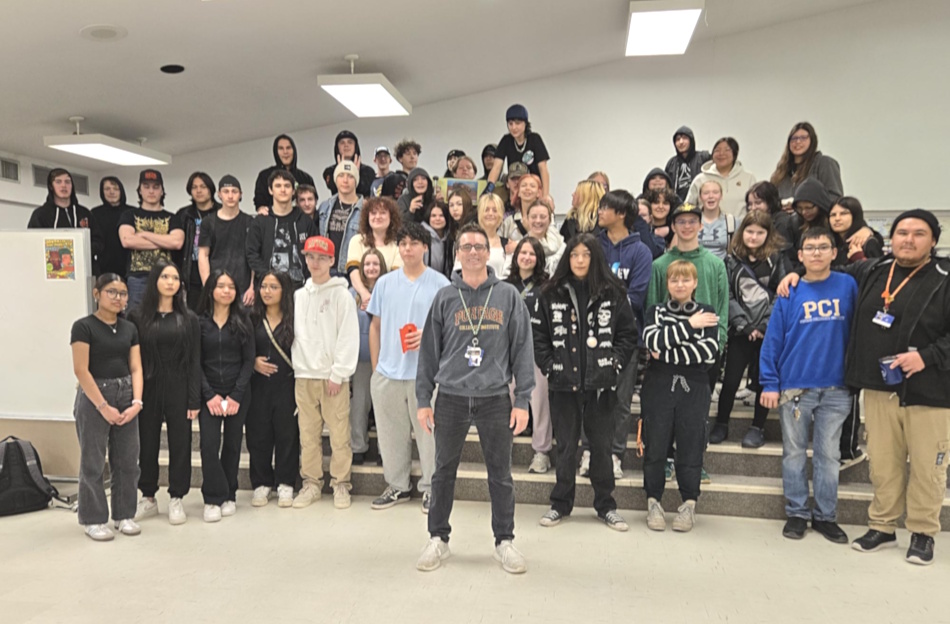 A group of students with Tyler Mauws in the "multi"