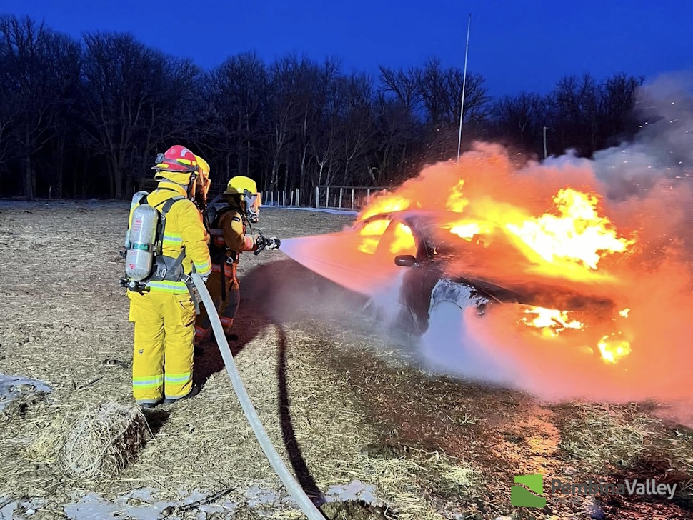 Two fire fighters at work