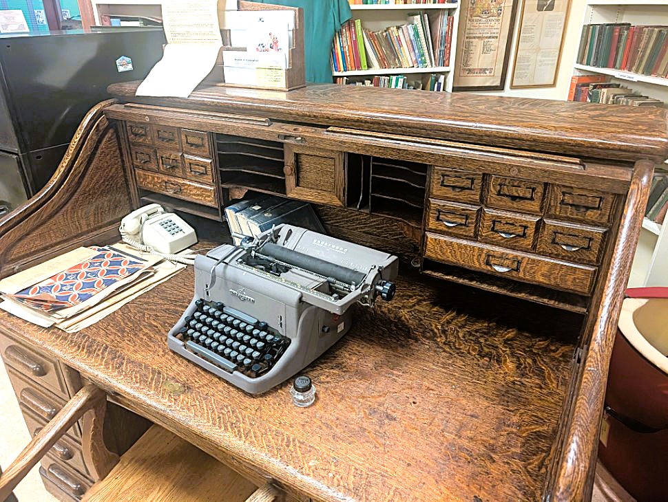 A prized rolltop desk at the Museum of Schools Room visit at Peacock with Marlis Duff and Carrie Kiefer 2025 (photo by Gordon Edgar)