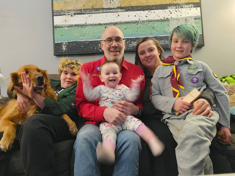 Jo-Anne dalton and her family piled onto a couch