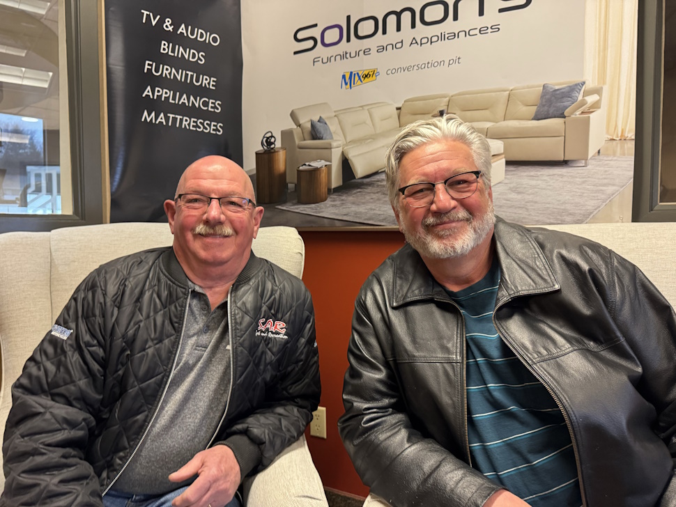Ken Dyck and Steve Neufeld sit in the MIX 96 studio
