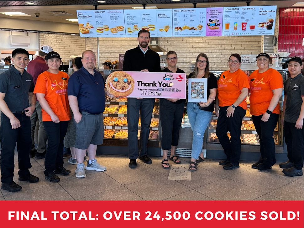 Tim's staff and ROC with cheque from smile cookie