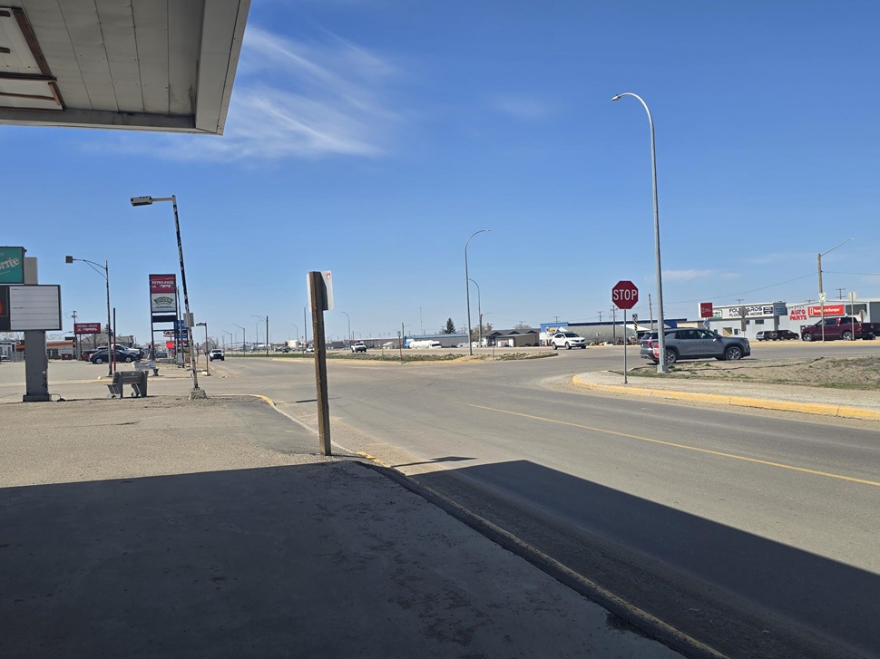 The intersection of Main Street and 11 Ave West.