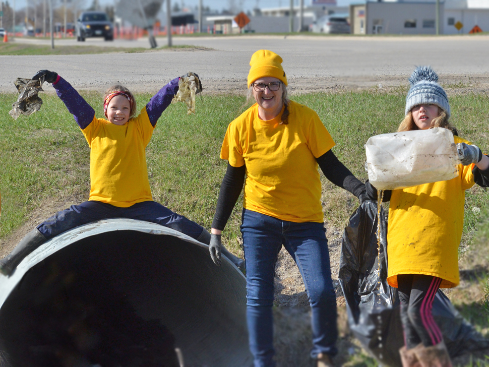 Volunteers were seen picking up garbage in ditches along Hwy 12 north on Saturday. 