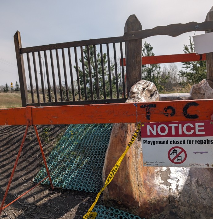 Riverfront playground slide repairs