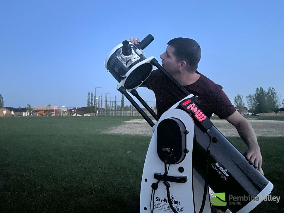 Kenton adjusting a telescope.