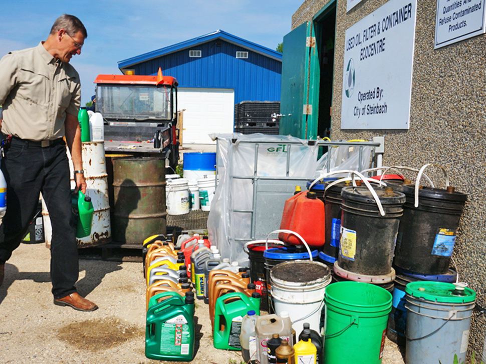 Local resident drops off used oil at Steinbach Landfill