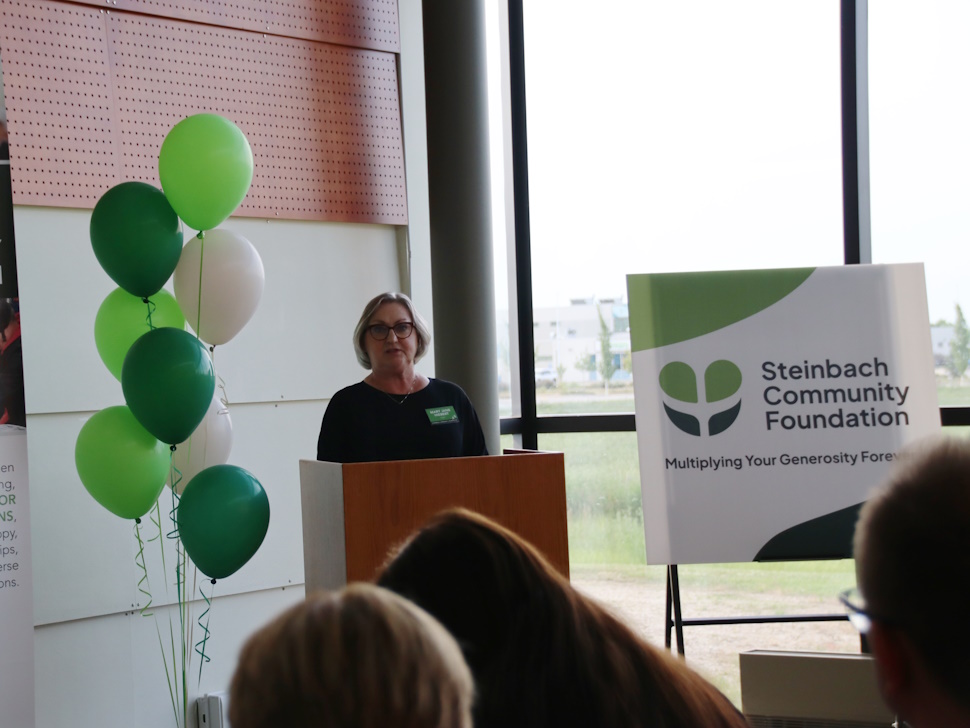 Mary Jane Hiebert presents AGM