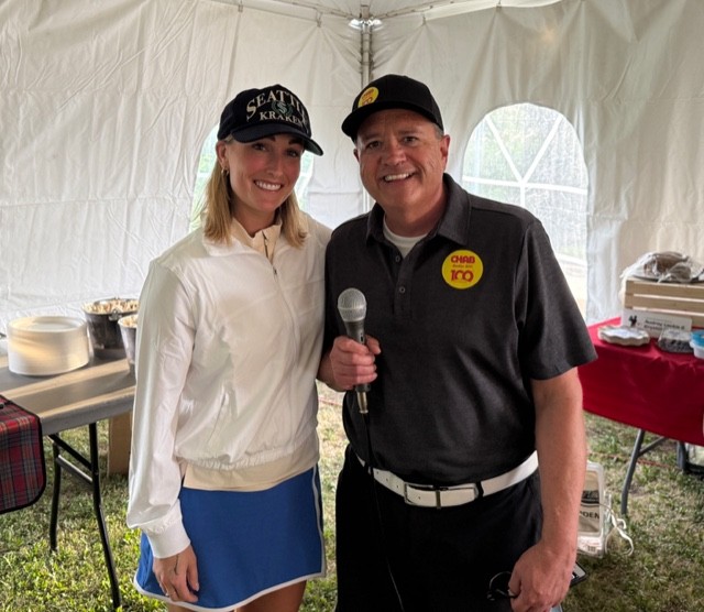 Seattle Kraken assistant coach Jessica Campbell is in this photo with CHAB's Rob Carnie. Both are dawning active golf wear as they participated in a local charity golf tournament this week.