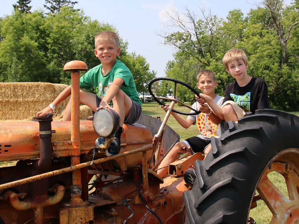 Kids playing on a tractor