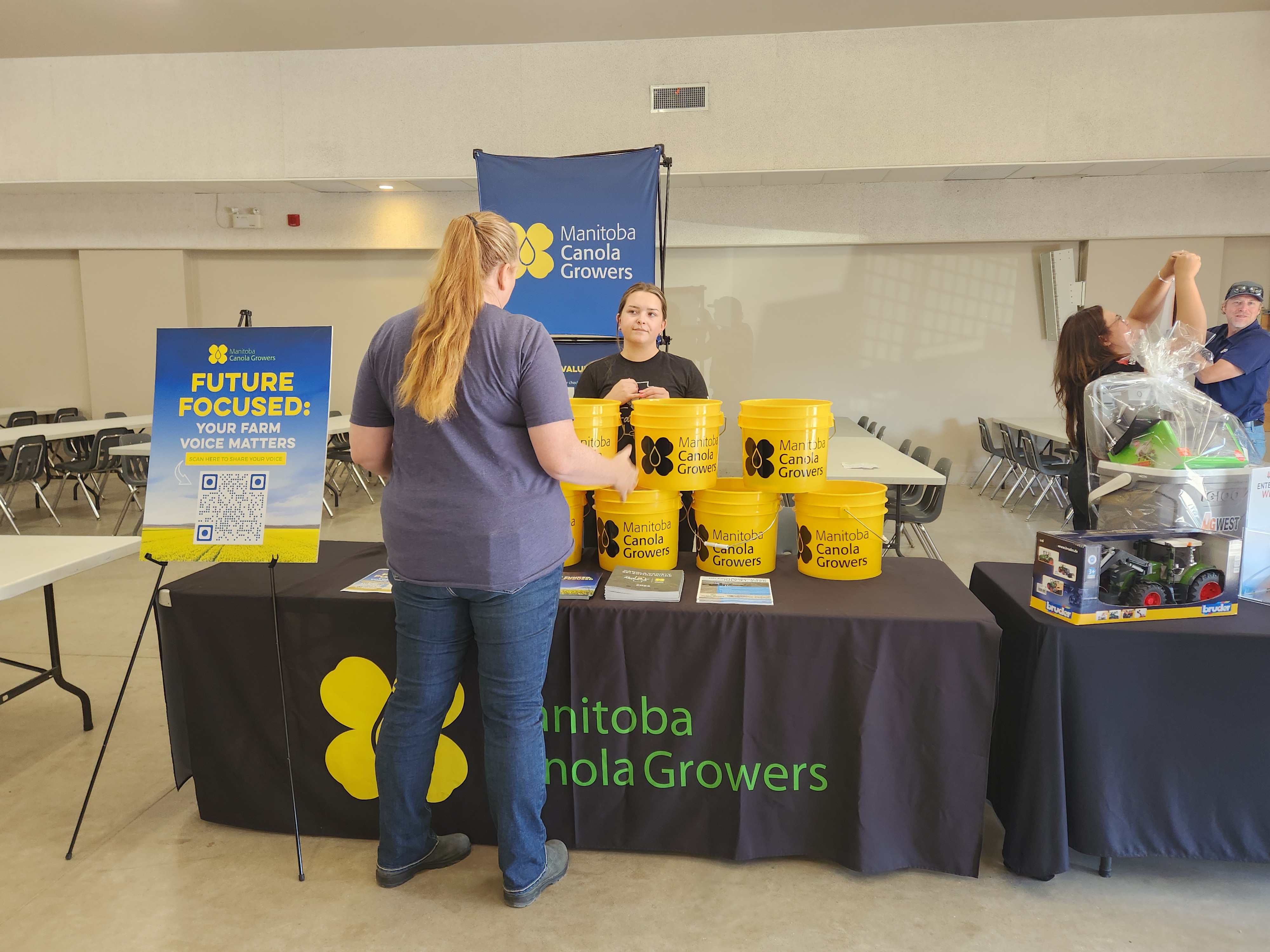 Manitoba Canola Growers, Had their table set up as well with buckets to give out.  PortageOnline/ Tristen Sokolosky