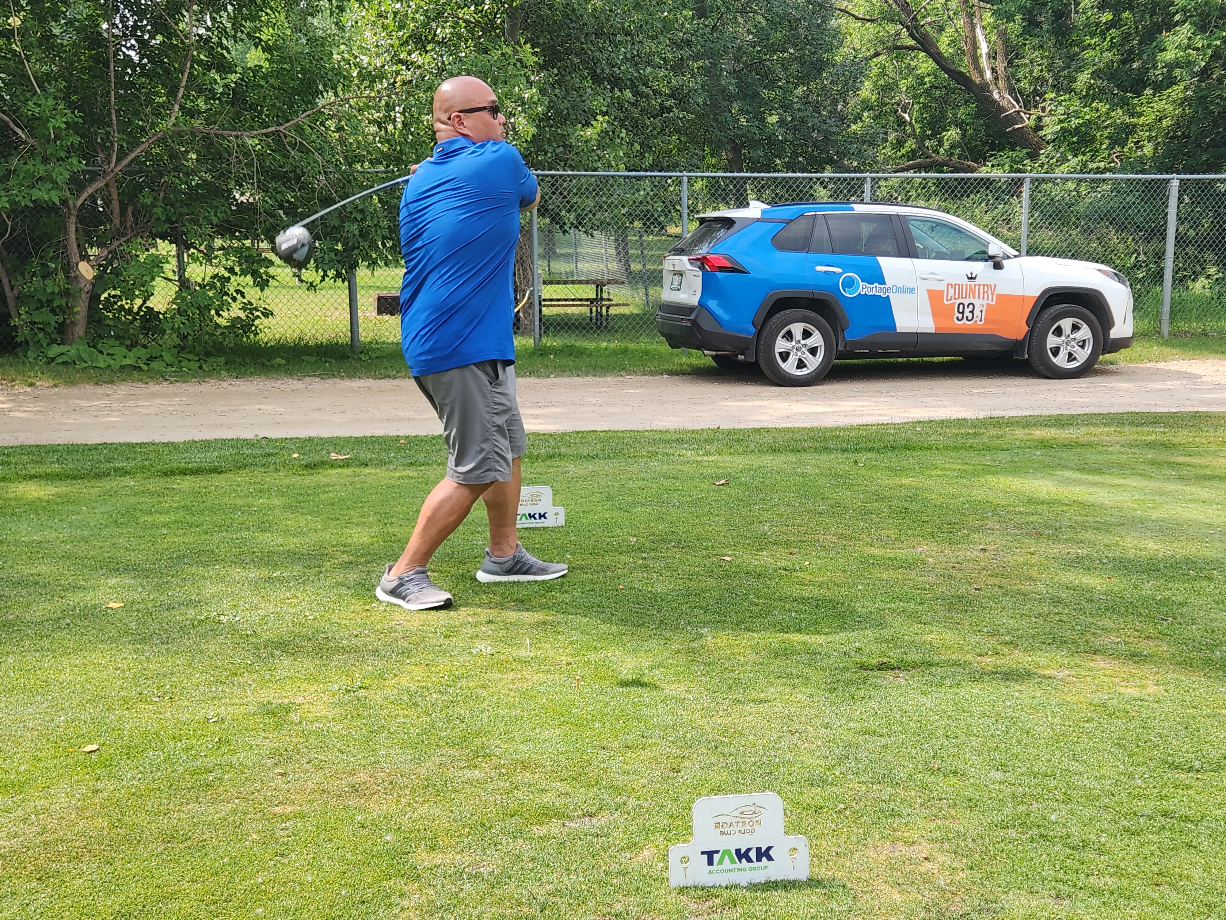 A golfer follows through on a strong drive under hot, humid skies during Stride’s fundraising tournament at Portage Golf Club. PortageOnline/ Tristen Sokolosky