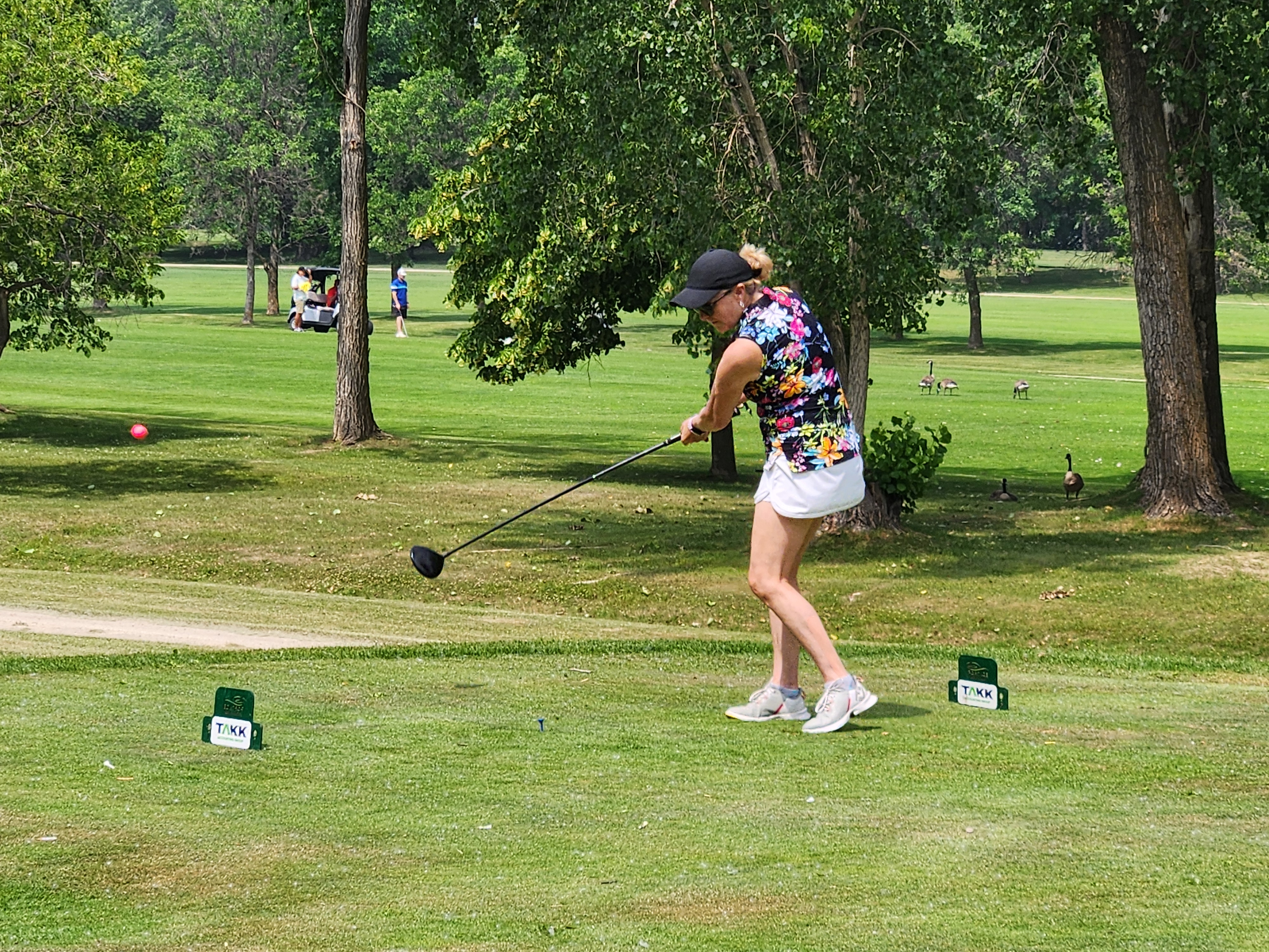 A golfer follows through on a strong drive under hot, humid skies during Stride’s fundraising tournament at Portage Golf Club. PortageOnline/ Tristen Sokolosky